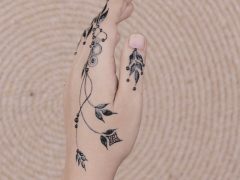 left hand with mehndi